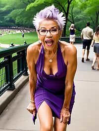 An elderly grandmother with a purple halter dress stands proudly in Central Park