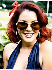 The woman stands out amidst the vibrant colors of the evening vegetable garden