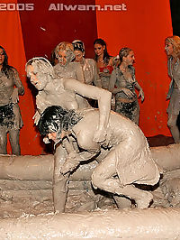 Large group of hot babes wrestling and getting extra muddy