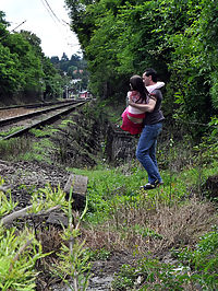 Couple being watched by a pervert while fucking near a train