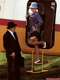 A retro flight attendant enjoys screwing a chap outdoors