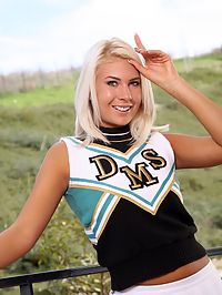 College cheerleader Danica strips out of her uniform to give YOU something to cheer about.