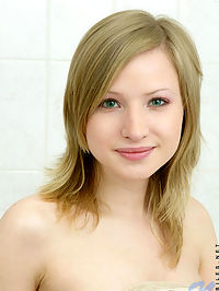 Adorable cute teen blonde totally nude posing in bathtub and showing her pinkish nipples