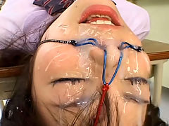 100 Shots of Bukkake : Riho Matsuoka gets 100 Shots of bukkake in a school uniform and tied up and has a ballgag in her mouth.