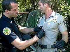 Gay Cop Bodybuilders : Badass cops Jean Pierre and Patrick Ives are always ready for hardcore anal fucking action. Watch these macho men in uniforms get extra frisky and take a break from their duties and engage in a nasty outdoor bareback cock slurping and deep asshole busting.