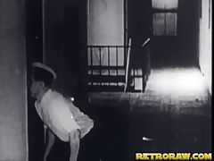 The peeping janitor : A janitor is creeping along the corridor of a hotel, peeping into all the rooms. In one a woman is taking a piss on the toilet. In another a girl is stripping. In the third room is a naked couple. They climb onto the bed to fuck each other.