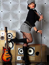 Retro Danica in 60s style mini skirt, pantyhose and boots