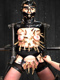Siouxsie Q vs Claire Adams : Raven haired and American Sioux Indian Siouxie Q signs up to be mercilessly tormented by Claire Adams. Be careful what you wish for, or you just may get it.SCENE 1Siouxsie is bound kneeling in a latex box tie arm binder, latex posture collar, latex head harness, leather straps, thigh high stockings, and high heels. She mentions breast bondage scares her, so we fully exploit her fears and aggressively try to push her off balance and out of her comfort zone. Breast and genital caning are quickly followed by clothespins all over her torso. A blindfold is added and the clothespins are single tailed off until she cant take it any more. To reward her pain journey, the vibrator and punishing hand fucking enter the picture. We find out that she is a squirter... and what kind of cum slut she is going to be.SCENE 2She is in a chain dog house. Her neck is pulled in four directions by chain in a metal collar. Her ass is held up in doggy by chains around her legs and her wrists and ankles are screwed into the platform, entirely preventing her from escaping. A speculum is inserted into her asshole, going deep into her. A dick on a stick enters the picture and fucks her through the anal speculum. Claire goes after her feet with the cane. Her body is greased down like a pig and then layered with sheets of wax. The dick re-enters, fucking her pussy now. The bitch cums and cums. Unable to free herself, she has no choice but to submit.SCENE 3Finally, she is bound sitting on a vintage metal tractor seat. Her ankles are bound in cruel metal shackles and her wrists wrapped around her legs, secured in handcuffs, and attached to her neck. Tape is added to her hands and they ares shaped into balled fists, so there is no way she can help or alleviate her suffering. The only way Claire is going to hurt Siouxsie is if she begs for it. Her feet and ass are caned. The thighs earn nice red stripes against her creamy skin. She squirms and tries desperately to get away, which only makes Claire want to cane her harder and hurt her more. The cunt is on display for us to see, and ripe for the pickings. Since our slut cums so easily, its time to see just how many we can get out of her...